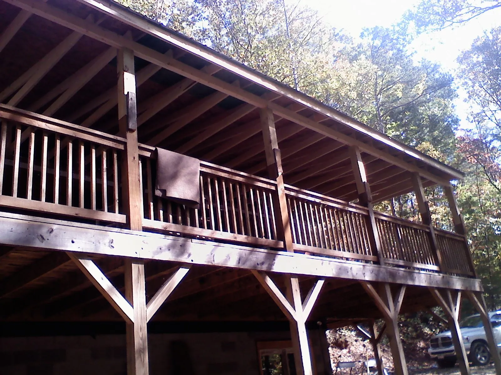Timber framing under a new elevated porch and deck — Roof Leak Repair in Wilmette by Roofing Brothers